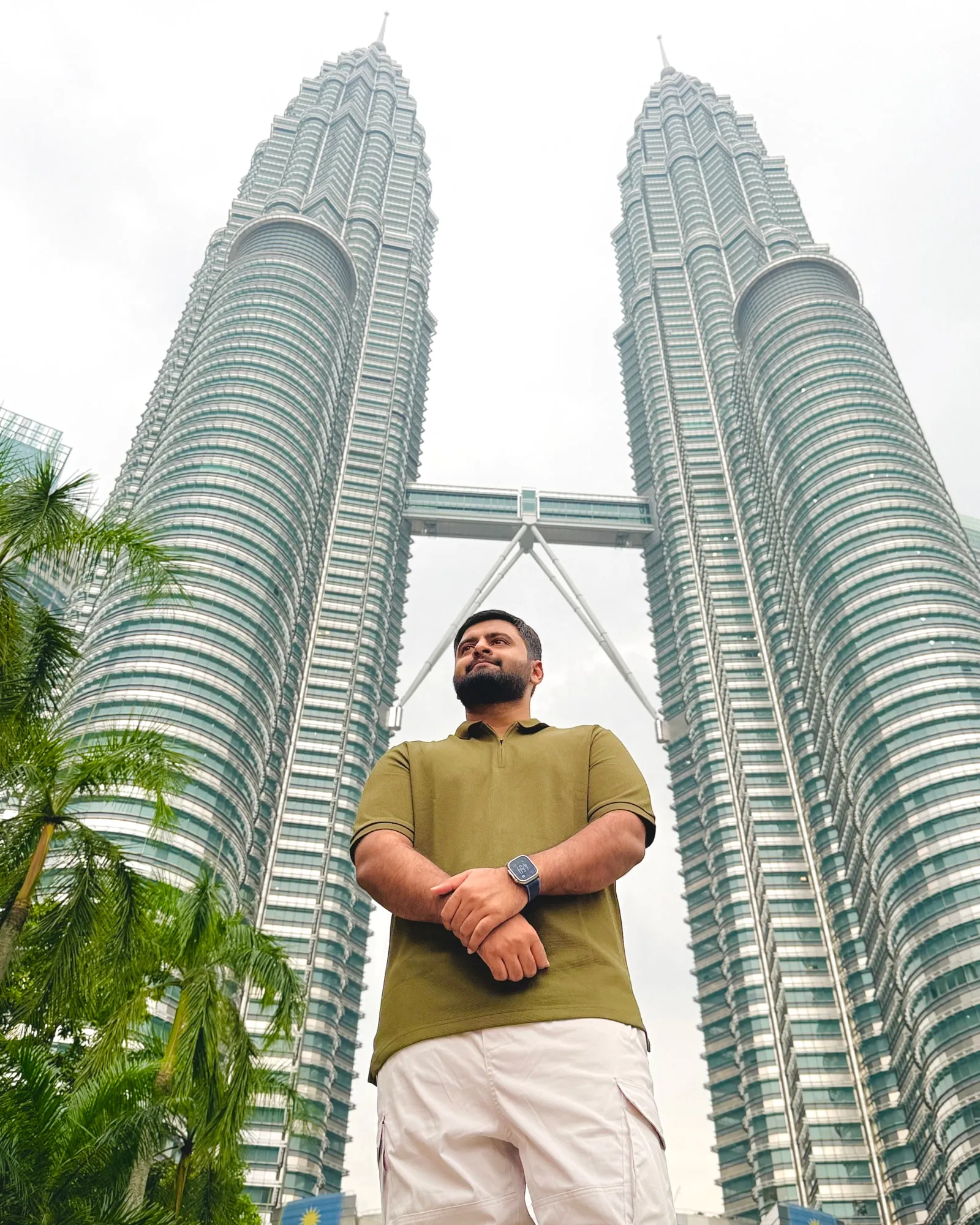 Syed Anas in front of the Petronas Twin Towers in Kuala Lumpur.